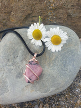 Load image into Gallery viewer, Rhodonite pendant necklace on a leather cord with a clasp
