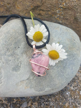 Load image into Gallery viewer, Rhodonite pendant necklace on a leather cord with a clasp
